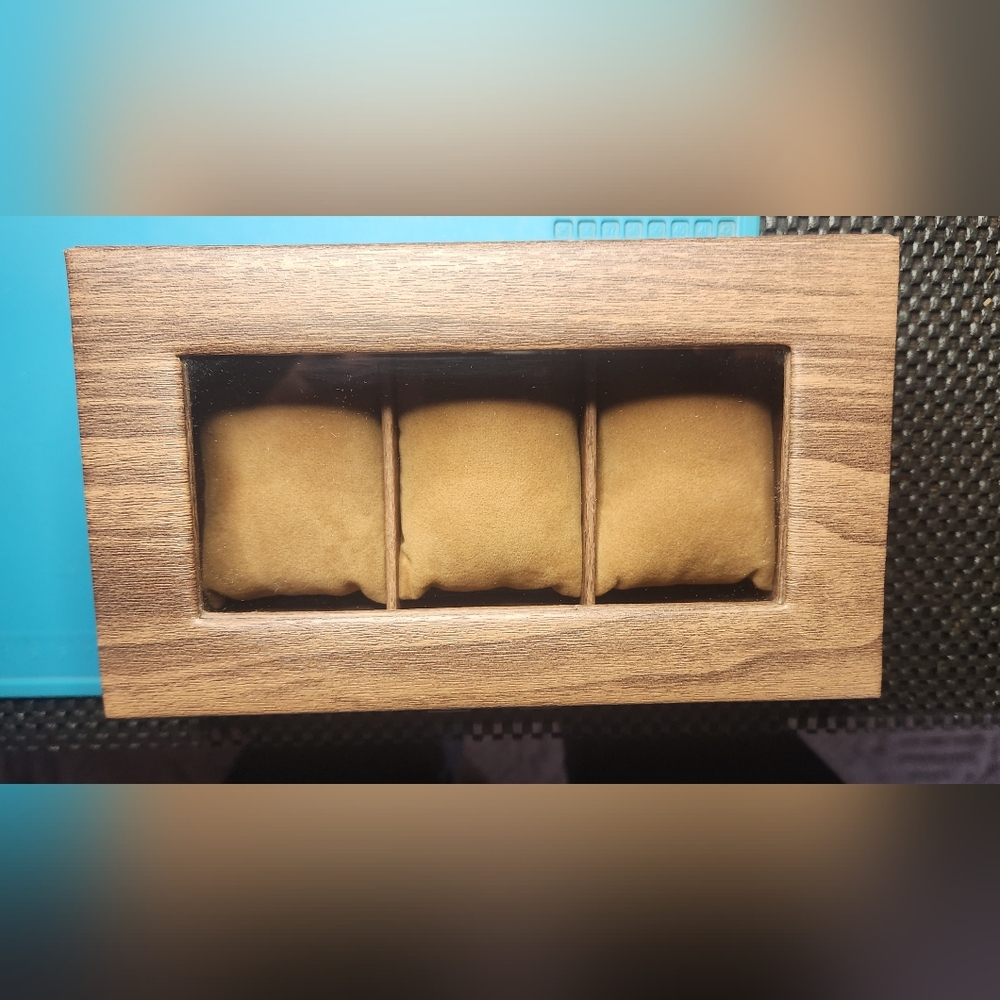 3 watch display protective case. Very solid. Great mortise hinges. Real glass!